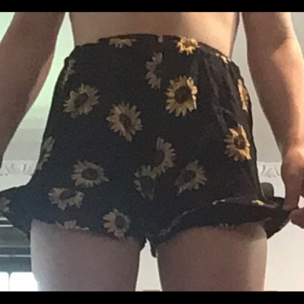 ROMWE black and yellow sunflower flowy shorts.